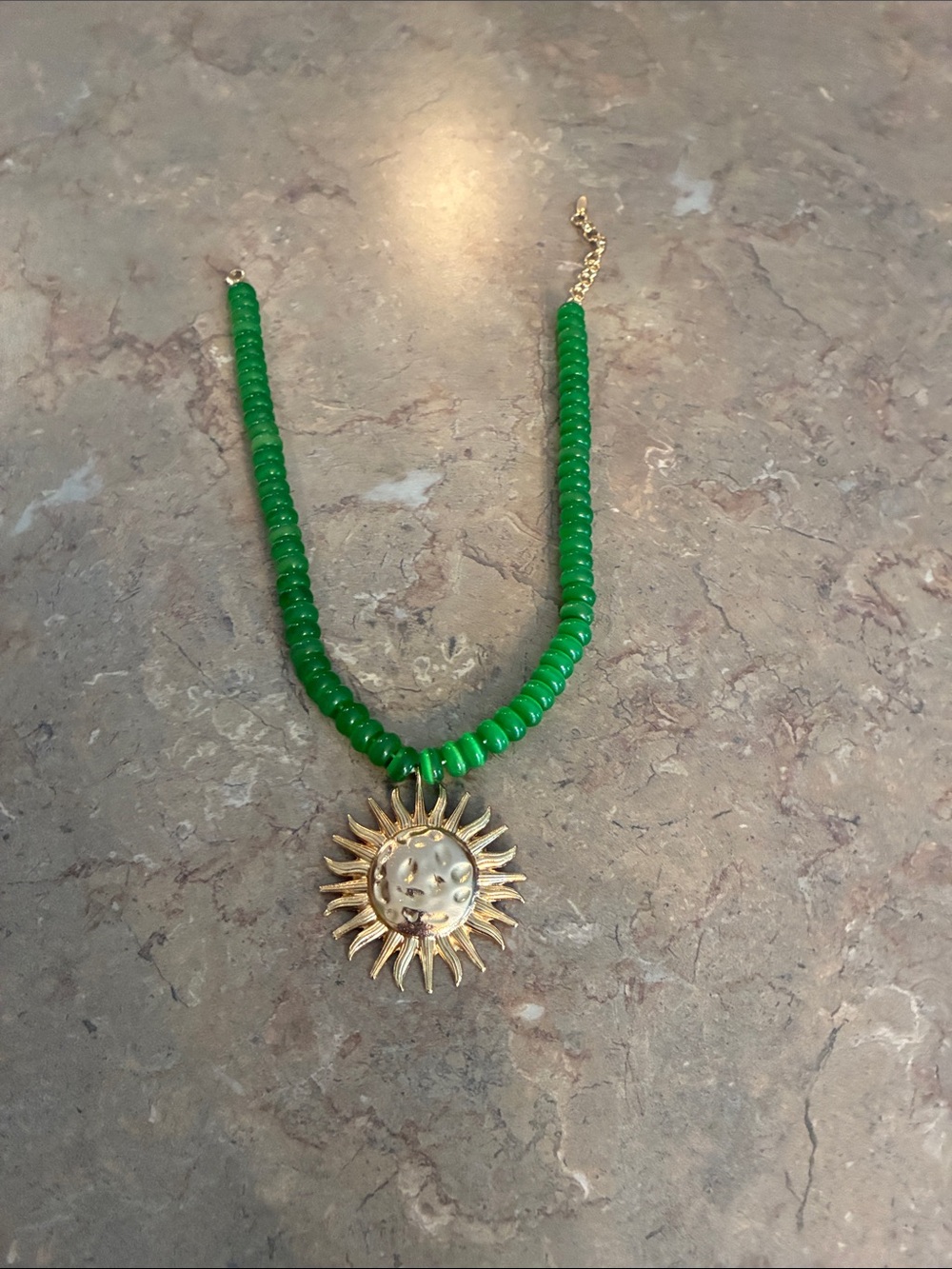 Anthropologie Emerald Green Beaded Necklace with Gold Sunburst Charm